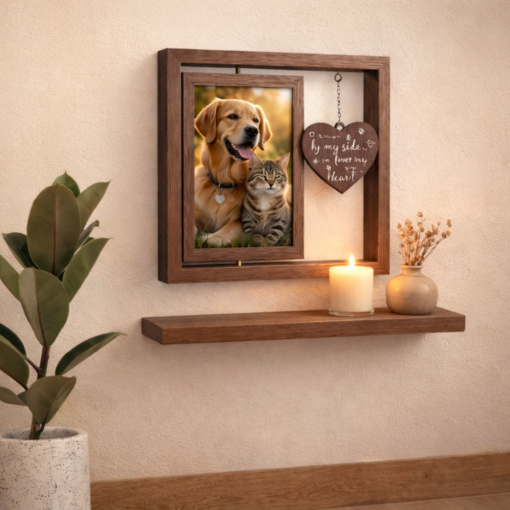 Rotating wooden pet memorial photo frame for dogs and cats with a heart pendant, displayed on a shelf as a keepsake for pet lovers